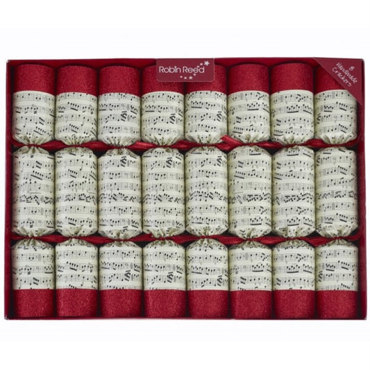 A set of eight musical Christmas crackers with gold and red design featuring musical notes, each containing a different colored metal handbell and numbered badge.
